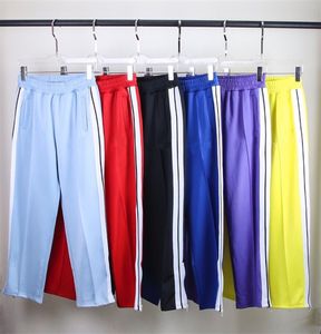 Men S Khaki Pants оптовых-Мужские женские штаны спортивные брюки дизайнеры дизайнеров трексуитов костюмы свободные пальто куртки толстовки с толщами толстовки с толщинами Друдистые брюки Rainbow Drawstring молния брюки повседневная спортивная одежда