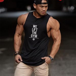 Muscleguys bodybuilding kläder mens muskelskjorta gym stringer tank top män väst fitness herrkläder patchwork tanktop