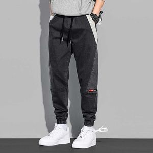 Ly designer mode män jeans lösa spliced ​​patchwork casual cargo byxor japansk stil streetwear hip hop joggers byxor byxor