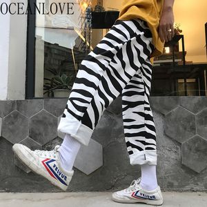 Striped Zebra Men Kvinnor Byxor Vår Höst Streetwear Pantalones Hög midja Looser Ropa Mujer 14809 210415