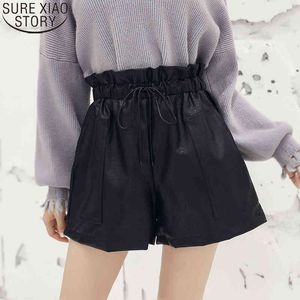 Hög midja dragsko kvinnor brett ben höst och vinter solid A-line elastiska koreanska PU läder shorts 10905 210417