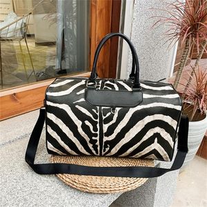Wholesale women weekender bag for sale - Group buy Duffel Bags Fashion Travel Bag Hand Luggage Zebra Pattern Tote For Women Crossbody Large Capacity Duffle PU Leather Weekender