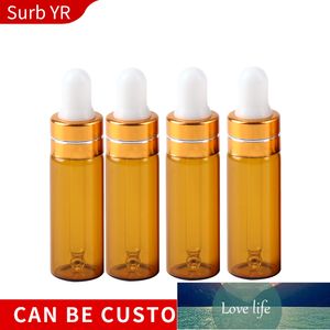 Contenitore cosmetico vuoto riutilizzabile per bottiglia di profumo riutilizzabile in vetro marrone portatile da 5 ml all'ingrosso con testa in gomma e contagocce