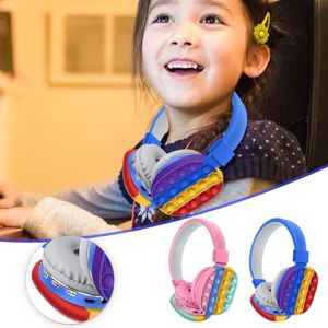 Huvudmonterad söt regnbåge Bluetooth stereo headset för barn, leksak fidget sensory push squeeze som gåva