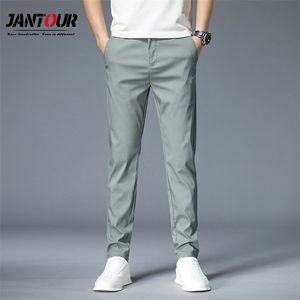 Мужские брюки весенние летние зеленый сплошной цвет моды хлопчатобумажная кармана аппликация полная длина случайные рабочие брюки Pantalon 210714