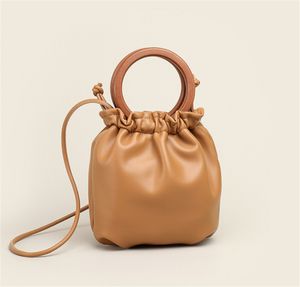 Ring wooden handle handbag casual soft leather fold bucket bag new shoulder messenger Crossbody female bags