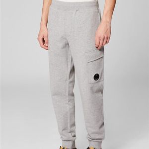 سراويل الرجال العدسة للرجال جيب sweatpant العصرية النحيفة النحافة سراويل الرجال عارضة ملابس كورية للملابس البضائع امرأة عالية الشارع