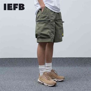 IEFB / desgaste masculino verão macacão casual solta tamanho grande bloco de cor patchwork zíper bolso calças homens shorts masculinos 9y1079 210716