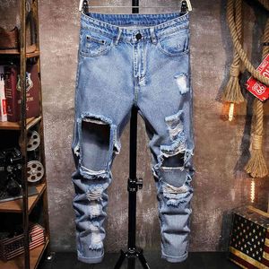 Sommar män casual manlig stor hål denim byxor hög gata hip hop man rippade byxor rakt lösa jeans