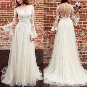 Flare z długim rękawem Czeski Suknie ślubne A-Line 2021 Suknie ślubne Aplikacje Koronki Przegląda Sheer Back Sexy Boho Beach Bride Dress Vestidos Brautkleder