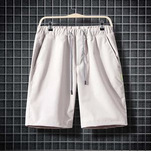 Tinta unita da uomo Capris estate nuovi pantaloncini hombres pantalones cortos pantaloni da spiaggia da uomo stile Hong Kong tuta ampia ampia X0705