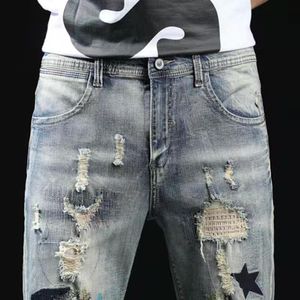 Mensbyxor shorts jean lila jeans korta kokosnötträd graffiti rippade capris shkinny jeans designers män kläder 418