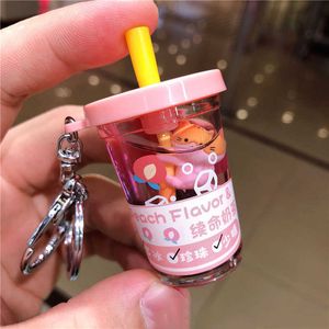 Creative Pearl Straw Milk Tea Cat Life Extension Keychain Cartoon Floating Kitty Liquid Key Chain Women Bag Pendant Keyfob Gifts G1019