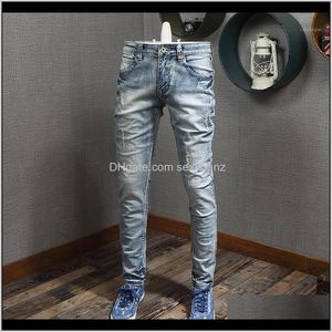 Abbigliamento uomo Abbigliamento Drop Delivery 2021 Moda stile italiano Jeans strappati patchwork blu chiaro Pantaloni denim elastici da uomo Slim Fit H