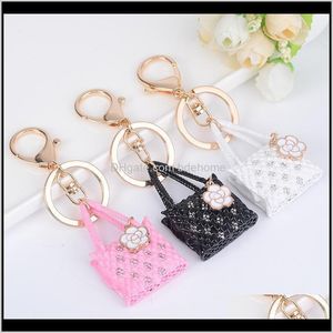 Keychains Fashion Aessory Drop Delivery 2021 White Black Pink Emalj Crystal Quadrate Handbag Flower Charm Key Ring Chains Holder Gold Colo