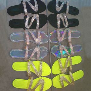 Kvinnor glider sandaler slipper sommarkristall platt sandal brev z sequins band tofflor öppna tå glida damer mode strand icke-slip skor stor storlek EU35-43 NO12