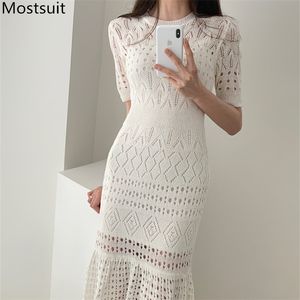 Sommar koreanska stickade sjöjungfrun långa klänning kvinnor kortärmad o-nacke solid mode ihåliga eleganta damer klänningar vestidos 210518