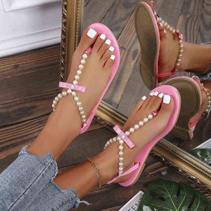 Europejska i Amerykańska Duża Pearl Bow Hot Wiertła Płaskie Dolne Rhinestone Clip Foot Herringbone Sandals Sandals Kobiety