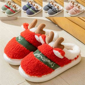 Novo 2021 Única Única Única Cervos De Natal Chinelos Mulheres Homens Indoor Quente Sapatos Soft Plush Home Amo Amantes de Inverno Plataforma Slipper H1122