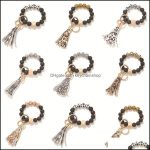 Nyckelringar Fashion Accessories Svart Frosted Wood Bead Armband Keychain Pattern Tassel Pendant Armband Women Girl Key Ring Wrist Strap 7