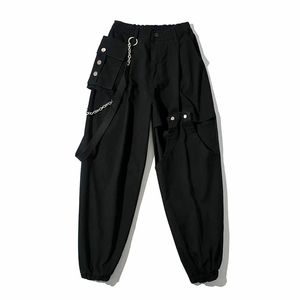 Mulheres Cool Ferramentas Estilo Hollow Out Grande Calças De Bolso Lado Feminino Cadeia De Moda Pingente Calça Elástica Pants 210531