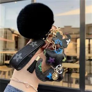 Luxury designer L Keychain Men Women Fashion Cat and deer flower Bag Pendant Accessories Cute Carabiner Keychains Lovers Car Keys Chains Key