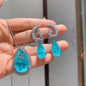 Megin D Weißgold Tropfen Blauer Stein Luxus Kristall Ohrstecker Piercing Boho Ohrring Anhänger Kragen Kette Halskette Schmuckset für Frauen