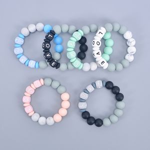 Braccialetti di perline in silicone BPA Massaggiagengive masticabili Bracciale perline per dentizione infermieristica con lettera d'amore gioielli Chewlry per bambini