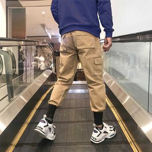 Mężczyźni Multi-Pocket Elastyczna Talii Design Harem Pant Streetwear Punk Hip Hop Casual Spodnie Joggers Mężczyzna Taniec Y0811