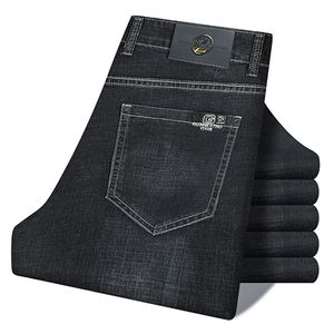 High-end marca masculina magro jeans primavera verão negócios casual calças de perna reta masculino outono inverno estiramento denim calças 220228