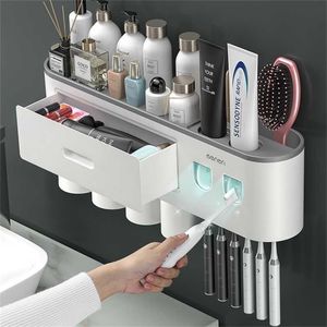 Magnetisk adsorption Inverterad tandborstehållare Dubbel automatisk tandkräm Squeezer Dispenser Storage Rack Badrum Tillbehör 211222