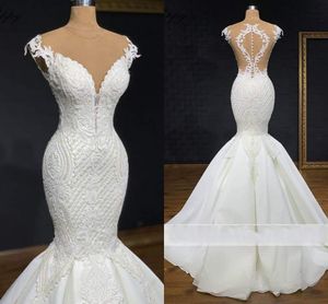 Luxury Lace Floral Mermaid Bröllopsklänningar 2022 Sheer O-Necktäckta Knappar Trumpet Garden Bridal Gown Vestido de Noiva