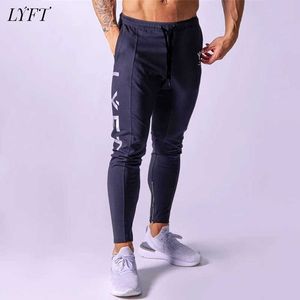 Lyft Yeni erkek Spor Rahat Pantolon Katı Renk Pantolon Erkek Gençlik Popüler Gevşek Bel Pantolon X0615