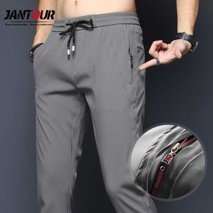 Spring Summer Casual Men's Pants Slim Fit Chinos Fashion Thin Zipper Pocket Elastic Waist Fast Dry Trousers Male Brand Clothing 210707