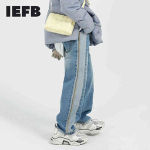 IEFB Mäns Slitage Färg Block Patchwork Blå Jeans Vår Koreanska Streetwear Design Tvättade Denim Straight Loosed Trousers 210524
