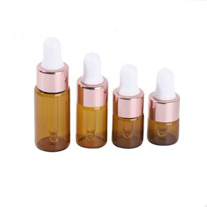 300pcs 1ml 2ml 3ml Small Amber Glass Dropperflaskor Flaskor med Rose Gold Cap Essential Oil Perfume E Liquid Bottle Contianer