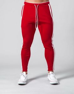 As calças jogging dos homens de marca esportes calças esportivas esportivas primavera e outono qualidade fitness casual calça