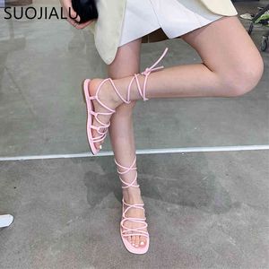 Suojialun Nova Moda Mulheres Sandálias Flat Heel Back Strap Lace Up Sandal Moda Estreita Banda Gladiador Sapatos Casuais Zapatos Mujer K78