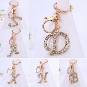 26 Buchstabe Kristall Strasshaut Legierung Schlüsselbund Charm Gold Key Ring Frauen Autoschlüsselhaltertasche Ornamente Accessoreeis DE097