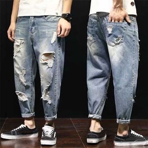 Moda Mens Baggy Rasgado Hole Calças de Jeans 2020 Estilo de Rua Azul Denim Calças Soltos Lavagem Calças de Jeans Mid-Cintura Vaqueros Rotos de Hombre X0621