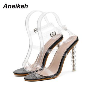Aneikeh Kristal PVC Zarif Tatlı Moda T-bağlı Garip Stil Sandalet Düğme Muhtasar Parti Ayakkabı Kadınlar Için Yuvarlak Ayak 210626