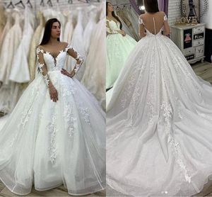 Dubai Saudi Arabic Ball Gown Wedding Dresses Button Back Illusion Long Sleeves Lace Appliqued Bridal Gowns Puffy Tulle Skirt Court Train Vestidos De Novia AL9089