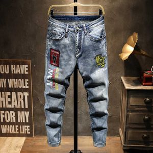 Europeiska män dsq varumärke slim jeans denim byxor stretch blå patchwork hål byxor för män rippade jeans js1059 x0621