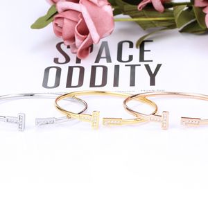 Titanium Stahlmanschette Armreifen Mikroskop Zirkon 18 K Gold plattiert Buchstabe Eröffnung Armband Armreif für Frauen Modeschmuck