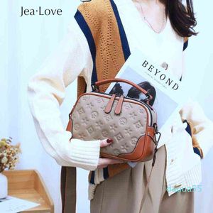 Axelväskor Jea Love Cross-Body Portable First Layer Cowhide Embossed One-Shoulder Small Round Bag 1213