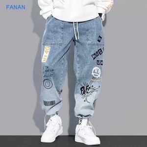 Yoa Autumn New Letter Printing Jeans Men's Fashion Märke Lossa tecknad graffiti leggings och dragkantor x0621