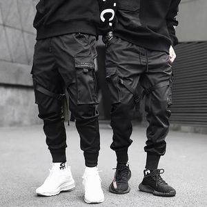Calças masculinas primavera outono fitas harem joggers homens carga streetwear hip hop bolsos casuais faixa masculina haruku moda calças