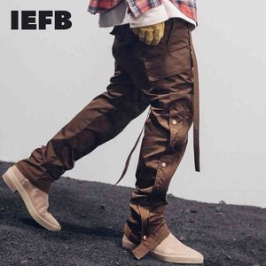 IEFB / Jesienno-zimowa moda uliczna Męskie spodnie bojówki z zatrzaskami bocznymi Hip Hop Slim Fit Wstążkowy pas Spodnie dresowe Elastyczny pas 9Y4214 210524