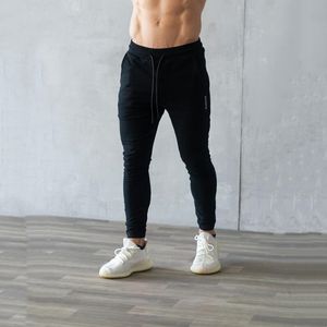 Autunno joggers pantaloni casual uomo in esecuzione pantaloni a skinny pista magro pista pantalone palestra fitness pantaloni maschili bodybuilding di allenamento