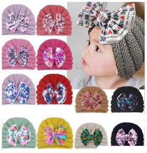 New Baby Girl Boy Berretto turbante lavorato a maglia Orecchie da coniglio Cappello con fiocco Toddler Kids Head Wrap Fascia per capelli Berretto di lana color caramella